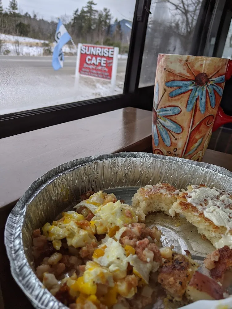 Hash and Eggs Enjoying Breakfast in Our Camper Van